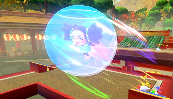 Super Monkey Ball Banana Rumble release date: A girl monkey zooming across the screen in a blue ball smiling