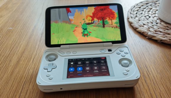 Custom image for Ayaneo Flip DS review showing the whole device with Lil Gator Game on screen