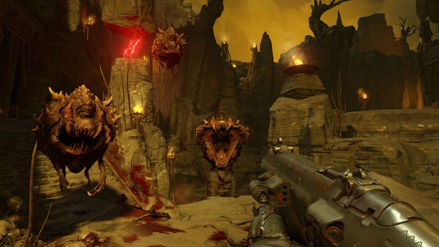 Player aiming a gun at monsters in Doom