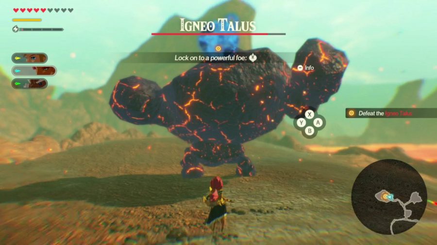 Urbosa is about to throw a bomb at an Igneo Talus, which is a giant fiery stone golem.