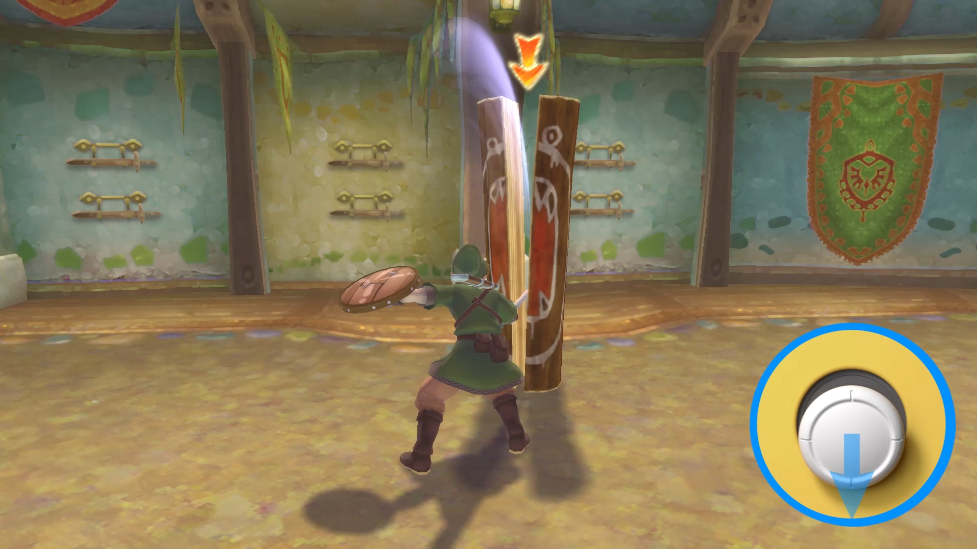 Link slashes his sword down through a log, while the screen shows the button prompt needed 