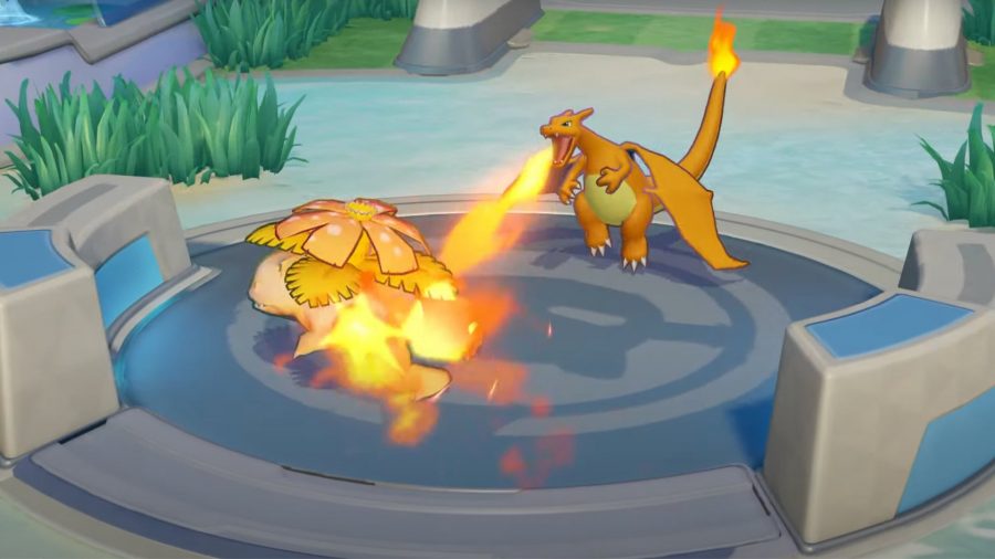 Charizard using flamethrower on Venasaur in Pokemon Unite