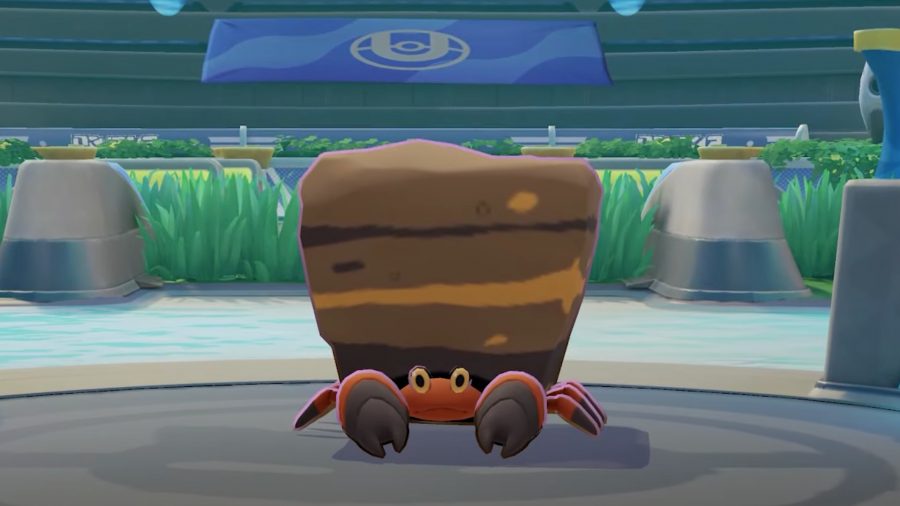 Pokémon Unite's Crustle standing in the arena