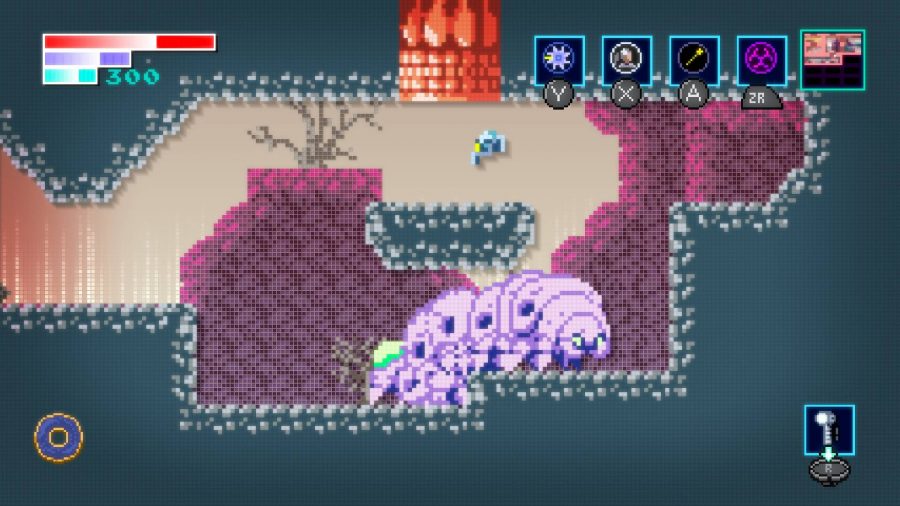 A small robot it jumping onto a platform, as a large, pink worm enemy is seen moving around below