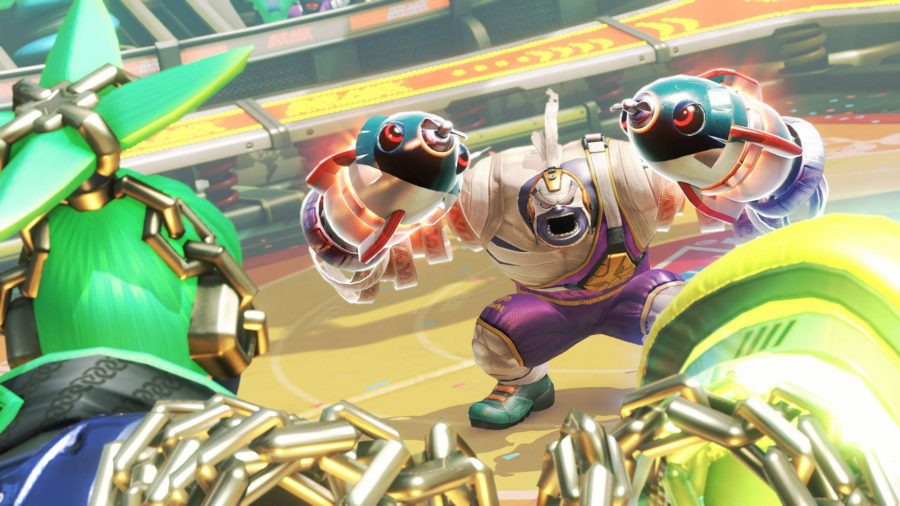 Two characters from ARMS face off in a ring, with their extendable arms outstretched ready for battle