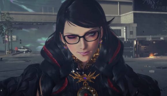 Bayonetta appears against the backdrop of a ruined city, winking at the camera