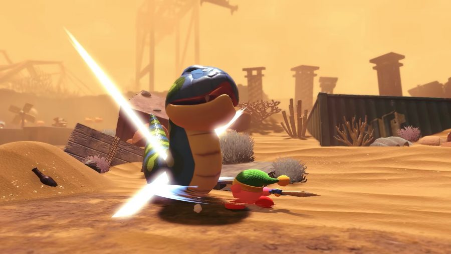 Kirby striking a snake with a sword