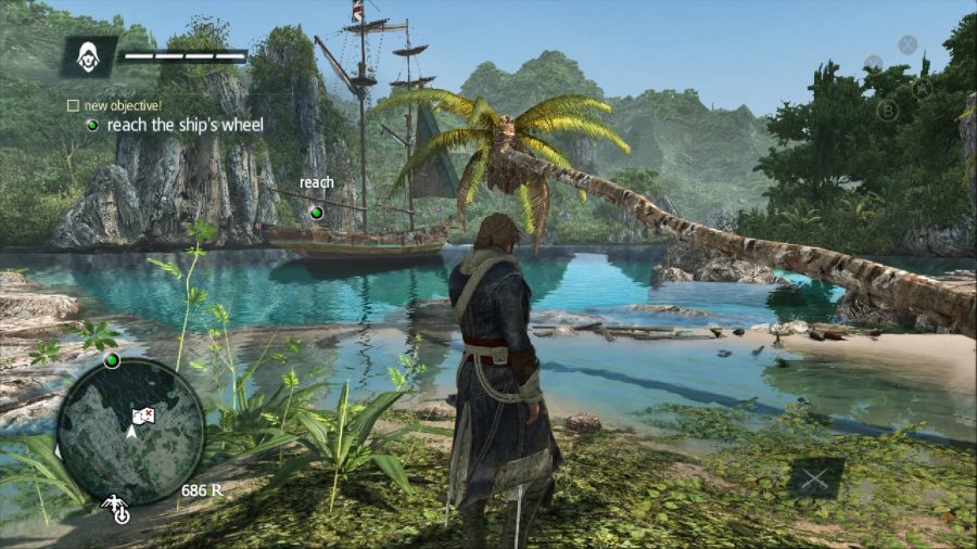 A pirate stands in front of a lush blue body of water, palm trees surround the shore and a ship is visible in the background 