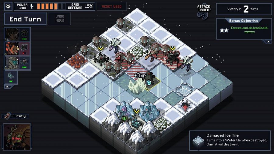 A pixelated scene shows an isometric grid. On the squares several buildings are visible, as well as robots and bug-like enemies