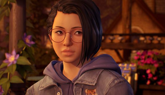 Alex Chen, from Life Is Strange: True Colors is shown. SHe is a young girl with brown, shoulder length hair, and round glasses. She is looking to her left with confusion on her face
