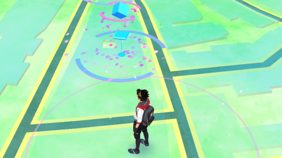 A Pokémon trainer near a Pokéstop