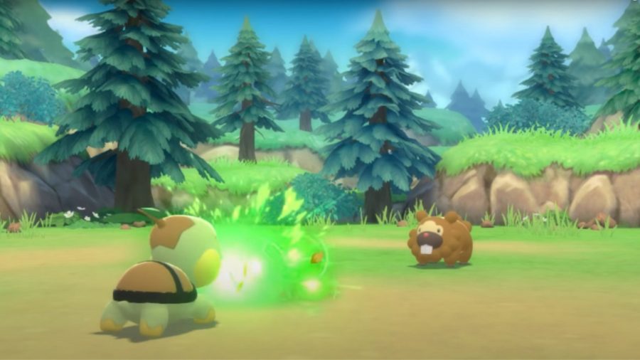 Two pokemon fighting on grass