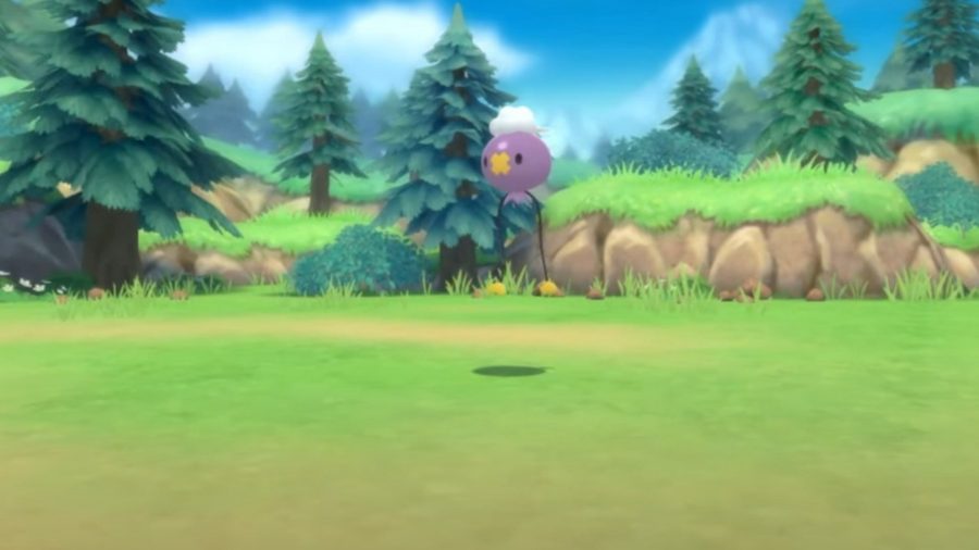 Pokemon BDSP Drifloon floating in a field