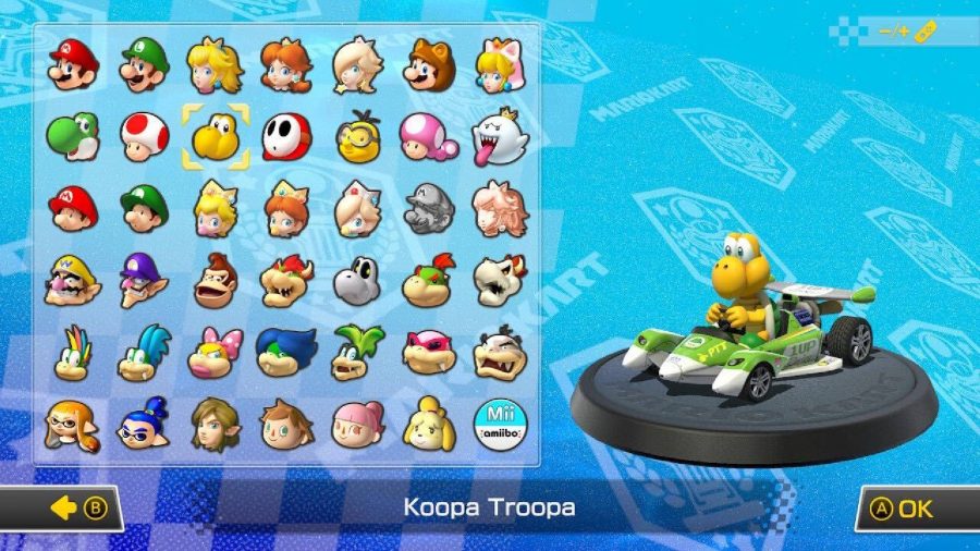 Koopa Troopa is visible on a character selection screen, sitting in a kart