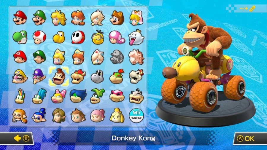 Donkey Kong is visible on a character selection screen, sitting in a kart