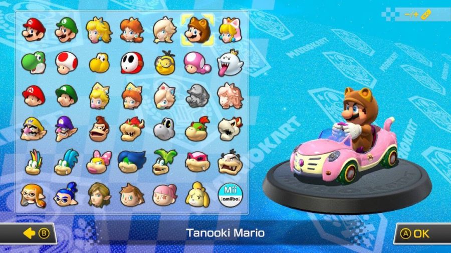 Tanooki Mario is visible on a character selection screen, sitting in a kart