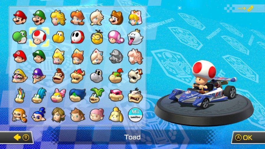 Toad is visible on a character selection screen, sitting in a kart