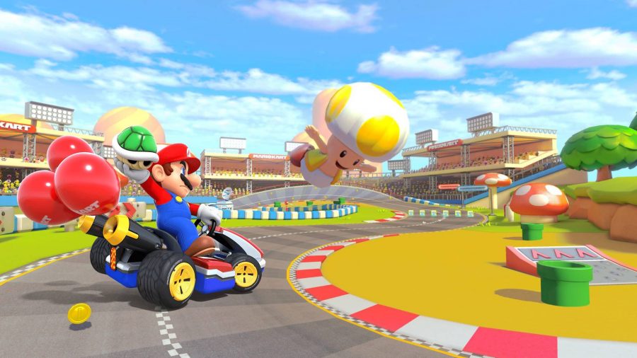 Mario drives a kart while turning around a sharp corner