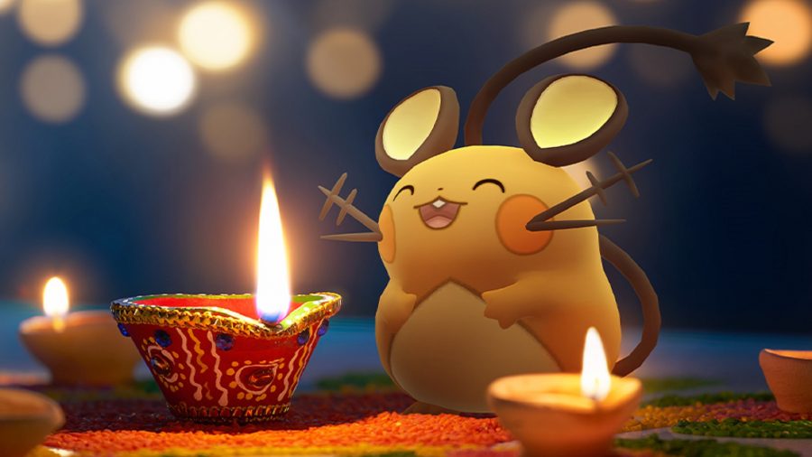 A Dedenne next to some candles