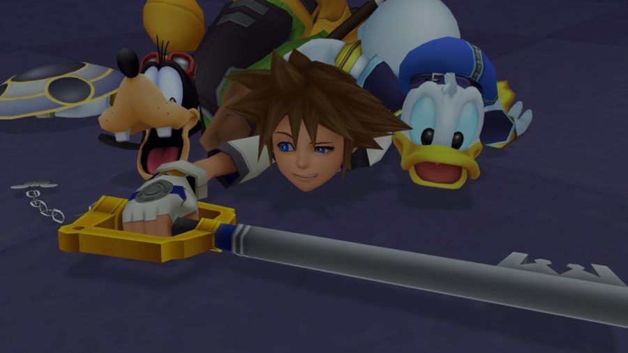 Sora, Donald, and Goofy on the floor with a keyblade