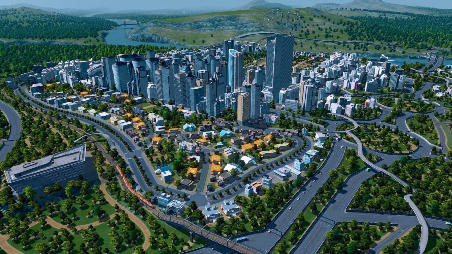 A screenshot from a game like Civilization, showing a city full of skyscrapers in Cities: Skylines.