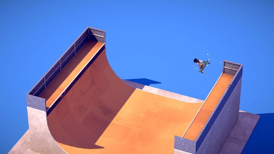 A skateboarder launches themselves up the side of a ramp