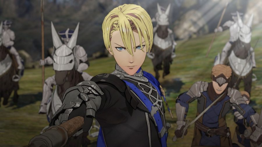 Claude from the Blue Lions house in Fire Emblem Three House, pointing forward with his lance with horses and soldiers in the background.