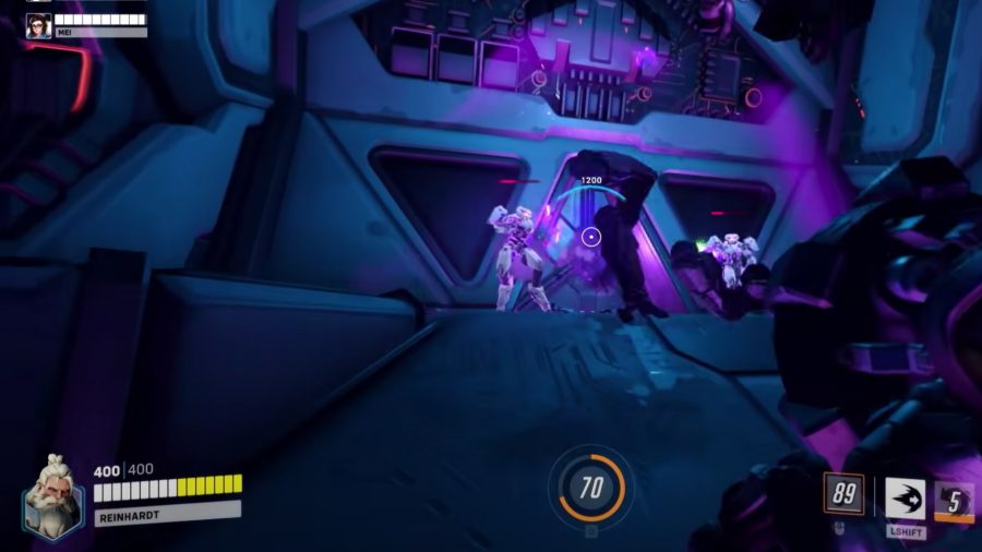 An Overwatch fight shrouded in purple light