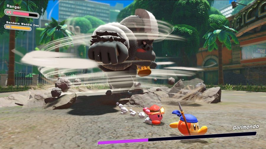 Kirby and Waddle Dee run away from a giant gorilla