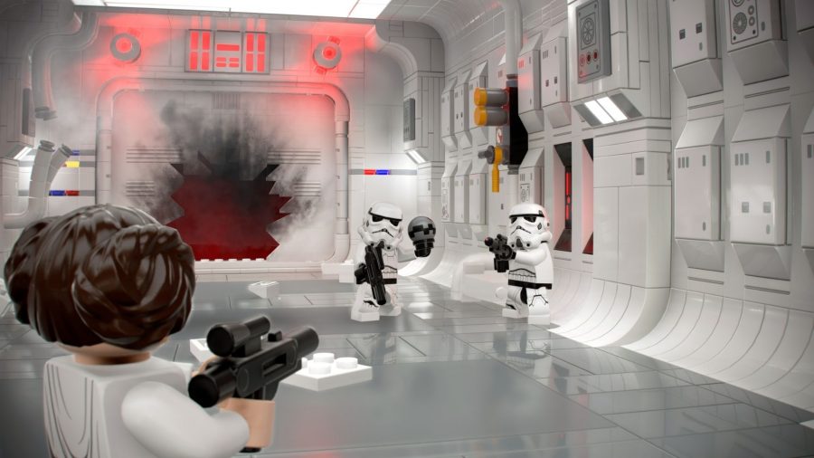 Leia shoots some stormtroopers in a spaceship in LEGO Star Wars: The Skywalker Saga.