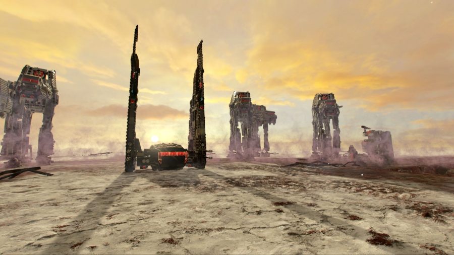 A ship lands in the desert, next to many ATATs in Lego Star Wars: The Skywalker Saga.