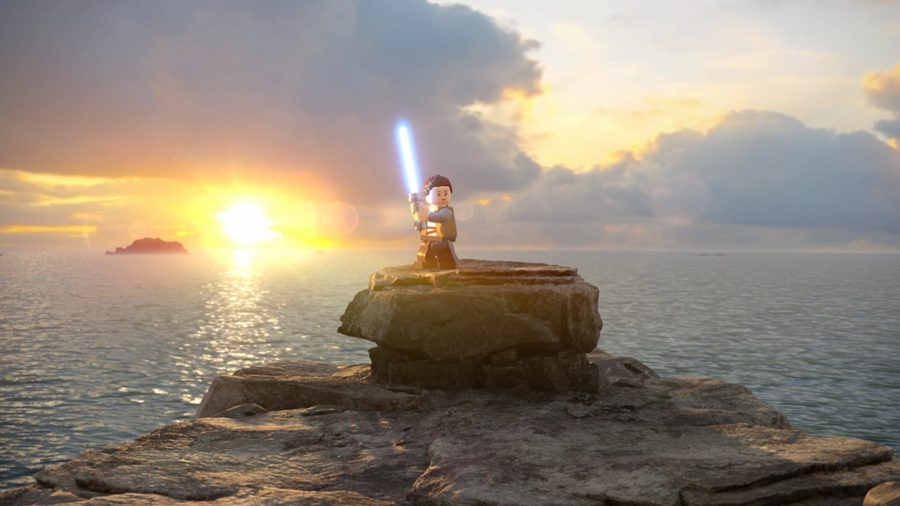 Rey standing on rocks 
