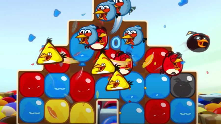 Loads of Angry Birds smiling as they get tossed against a wall