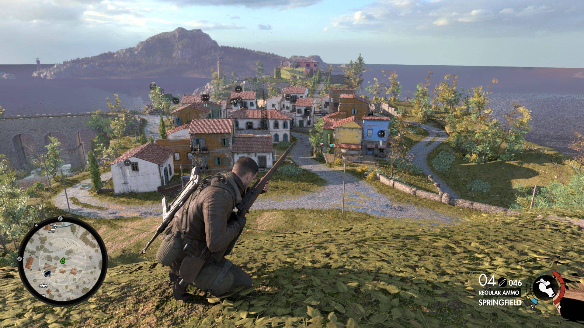 best spy games: a soldier stands on a hilltop readying a large sniper rifle