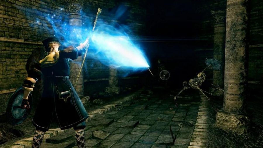 A Dark Souls magic character fires a blue light at an enemy on a stone bridge.