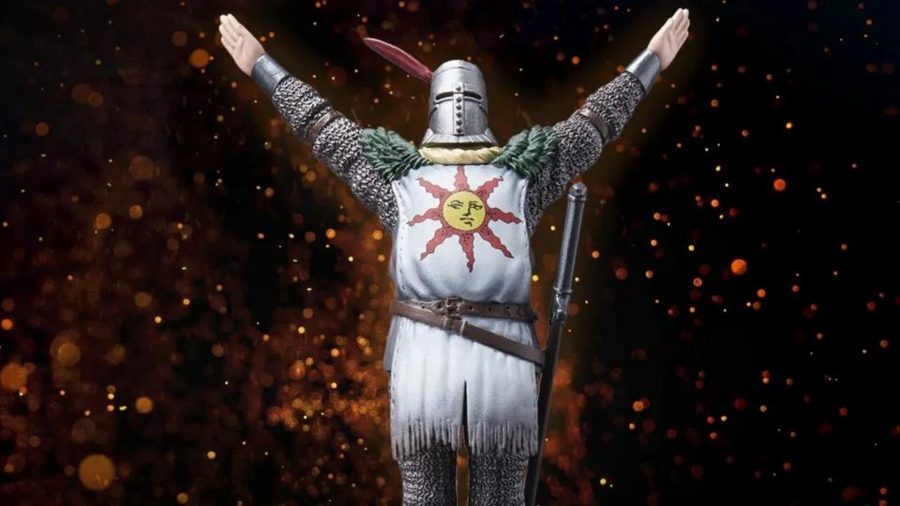 The Dark Souls Solaria amiibo, in the 'Praise the Sun' pose (both arms held up in a Y shape).