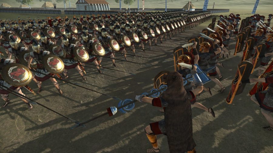 Spearman and sword and shield infantry clash in a screenshot from Rome Total War.