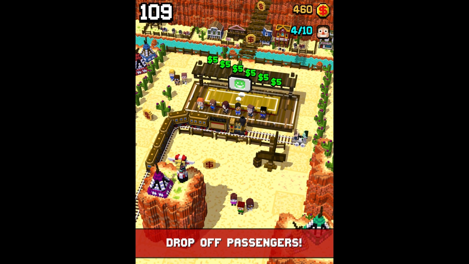 Addictive games - Tracky Train. A screenshot shows a train stopping at a train station in a desert area. Text on the screen reads "drop off passengers!"