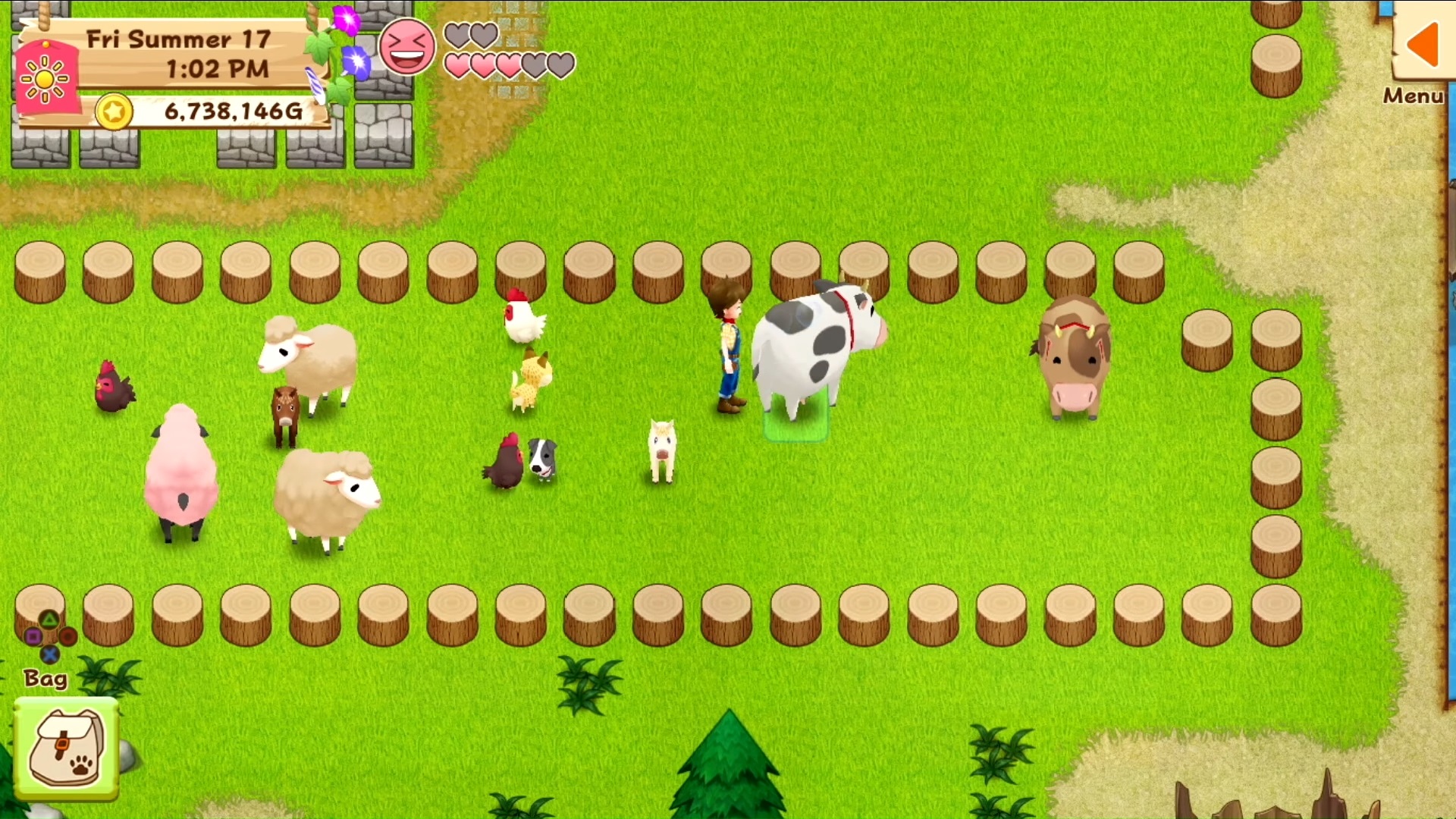Best farm games - image shows a character standing near a cow in a farm in Harvest Moon: Light of Hope.