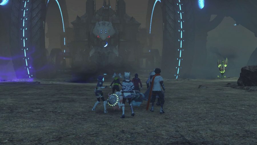 The multiple party members of Xenoblade Chronicles 3, standing on a sandy plain looking up at a giant mechanical vehicle, with two giant, hollow wheels either side of a spherical body.