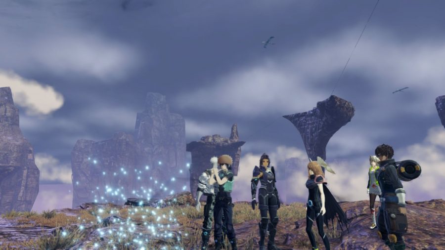 Noah, Sena, Mio, Taion, and Ashera from Xenoblade Chronicles 3, stood on a cliff edge, with various stoney outcrops in the distance, below a grey and clouded sky. They stand by small orbs of light rising from the ground, with Noah playing a flute.
