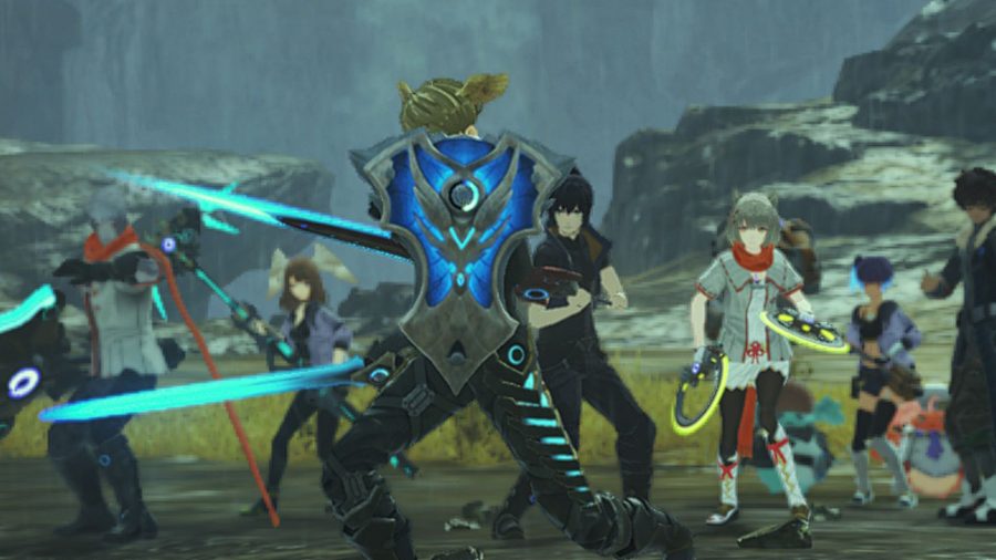 Numerous characters in a cutscene in Xenoblade Chronicles 3. The one in the middle has a shield covering their face, just their blonde hair and tiny wings on their head visible. They all have weapons wielded.