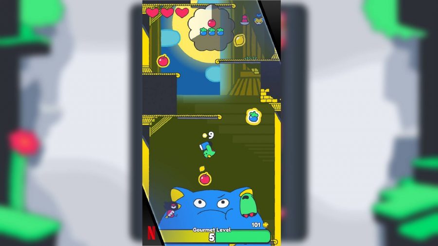 Poinpy reviiew: A little blue ball of a guy aims to jump upwards, with several fruit visible and a giant blue cat at the bottom of the screen