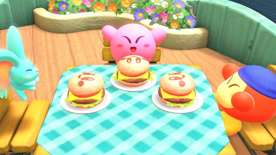 Kirby and his two friends eating some burgers