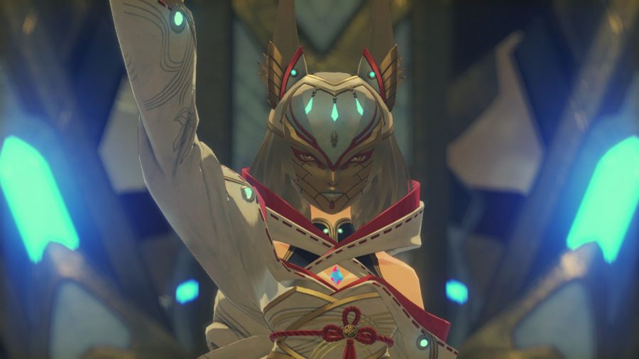 A character from Xenoblade CHronicles 3. A person with a white and red outfit, one arm aloft, golden ears from their head like a cat, and a golden mask over her face. She has short white hair.