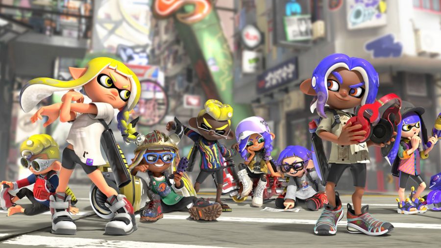 Various characters from Splatoon 3 hanging out on the street. Some have yellow hair, others purple. All characters are humanoid and small, with strange fish-like hair.
