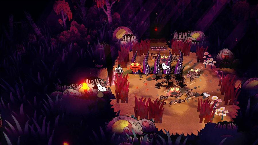 Cult of the Lamb review: a small lamb battles against several spider enemies in a wooded area