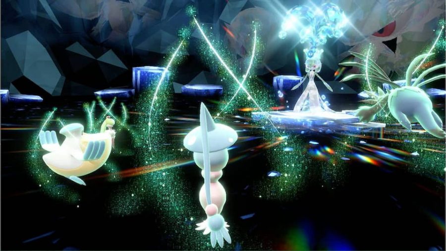 Batailles de raid Pokemon Scarlet et Violet tera: quatre Pokemon combattent un Pokemon terastal, et sont tous baignés dans une énergie lumineuse 