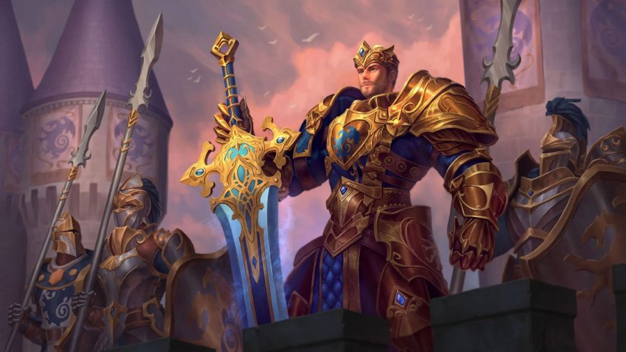 Smite character Arthur standing in all gold armour with his sword in hand